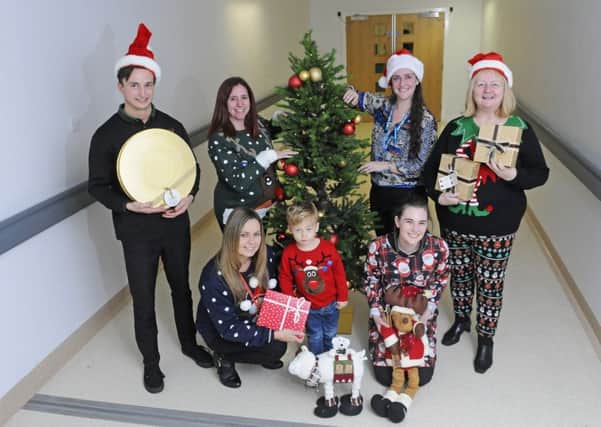 Launch of Christmas Gifts Appeal at Blackpool Victoria Hospital.  Pictured L-R are Liam Croft, Rebecca Ferguson, Louise Turvey with Austin Anderson, Hannah Corleff, Tiffany Bradford and Ann Healey.